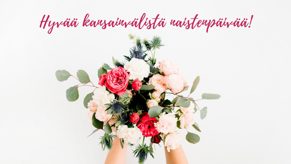 Kuvassa kukkakimppu, jossa vaaleanpunaisia ja valkoisia kukkia. Kuvan yläosassa teksti, jossa lukee: Hyvää kansainvälistä naistenpäivää.
